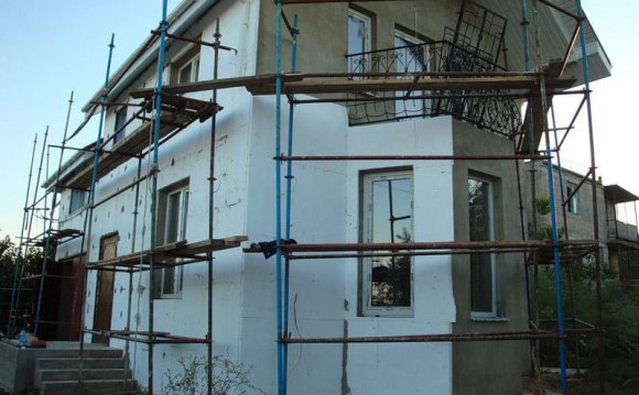Как утеплить фасад дома