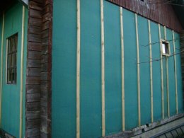 Простое и надежное утепление брусового дома панелями ISOPLAAT - фото 1